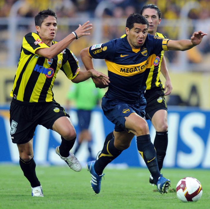 Juan Roman Riquelme á fullri ferð með Boca Juniors.