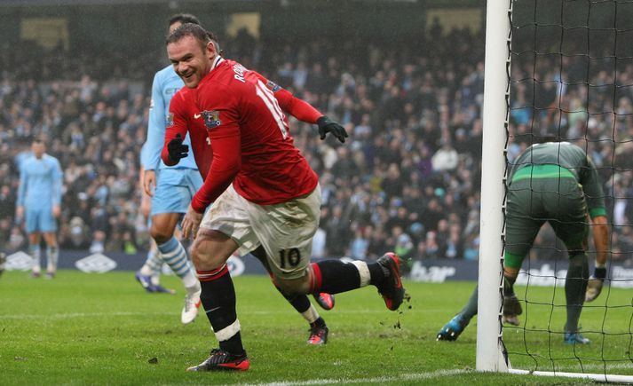 Rooney fagnar seinna marki sínu í dag.