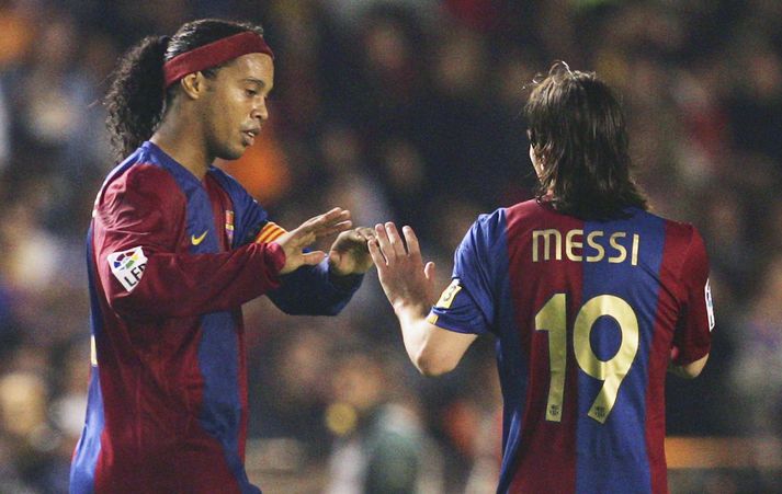 Ronaldinho og Lionel Messi þegar þeir léku hlið við hlið hjá Barcelona.