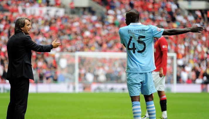 Roberto Mancini og Mario Balotelli,