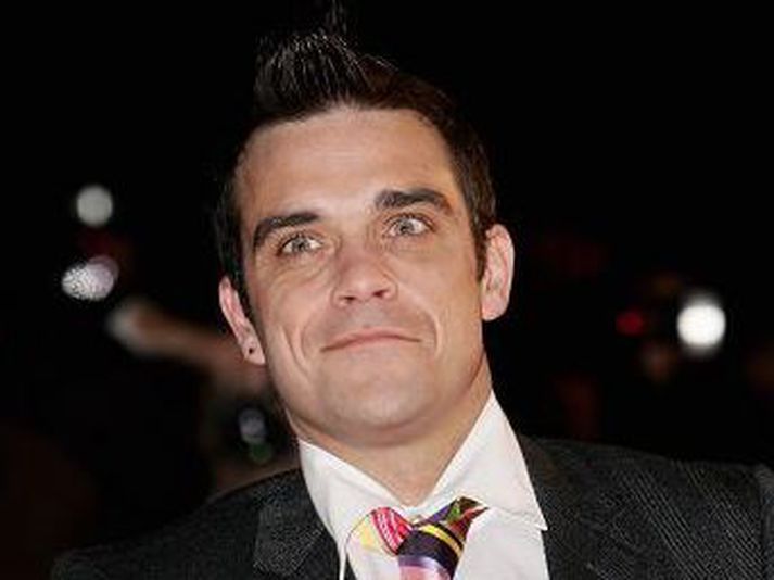 Robbie Williams er í reglulegu bandi við félaga sína.
