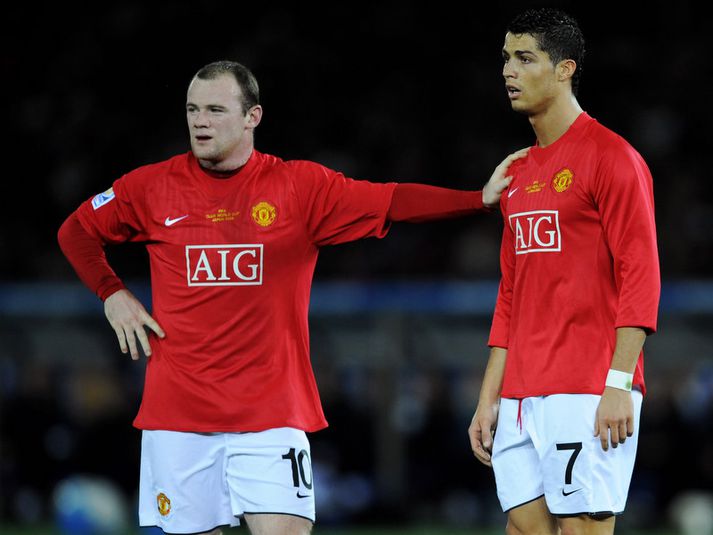 Cristiano Ronaldo með Wayne Rooney.