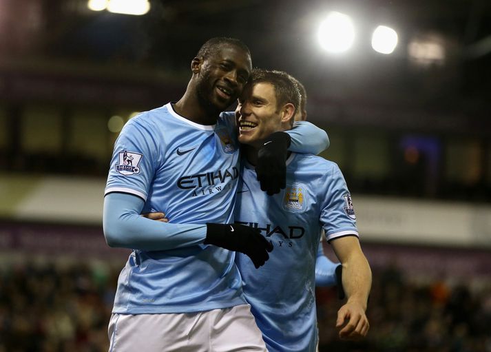 Toure og Milner fagna.