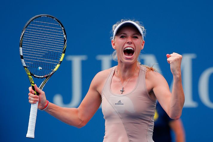 Wozniacki fagnar sigrinum.