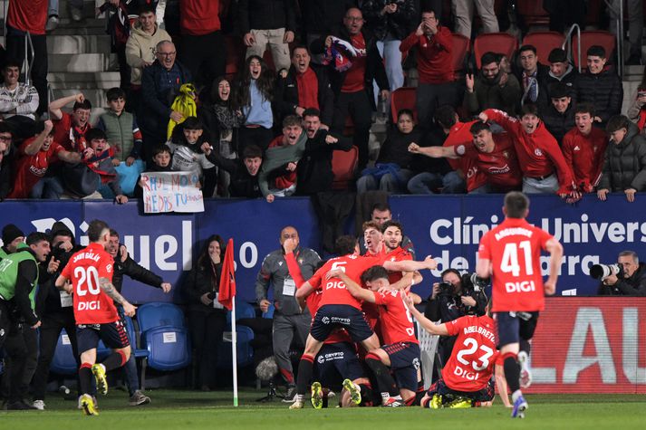 Leikmenn Osasuna fagna sigurmarki Raúls García gegn Real Madrid.