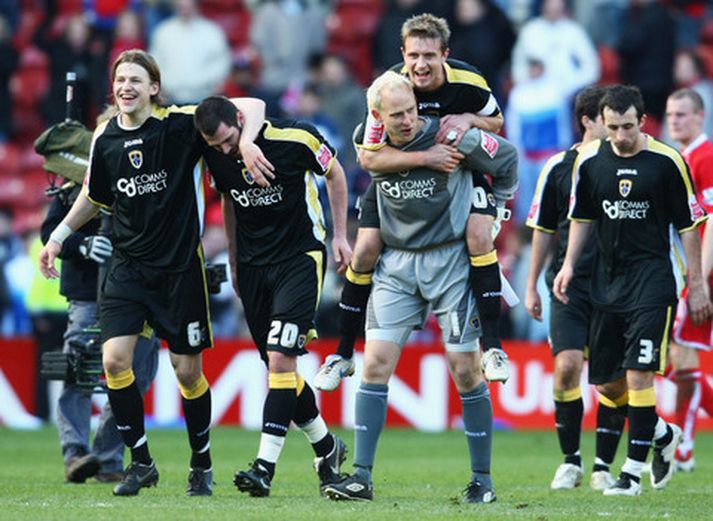Leikmenn Cardiff fagna sigrinum á Middlesbrough í fjórðungsúrslitunum.