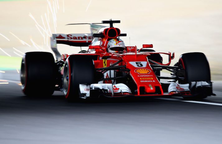 Sebastian Vettel á Ferrari var fljótastur á fyrri æfingu dagsins.
