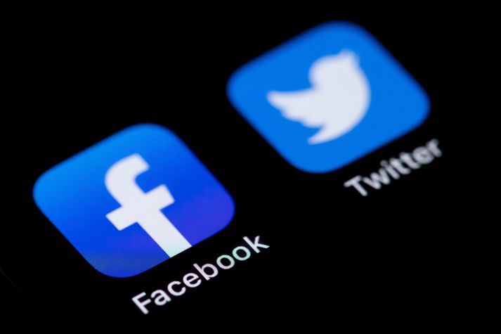 Social Media Apps KIRCHHEIM UNTER TECK, GERMANY - MARCH 09: (BILD ZEITUNG OUT) In this photo illustration, The Facebook und Twitter logos on the screen of an iPhone on March 09, 2021 in Kirchheim unter Teck, Germany. (Photo by Tom Weller/DeFodi Images via Getty Images)