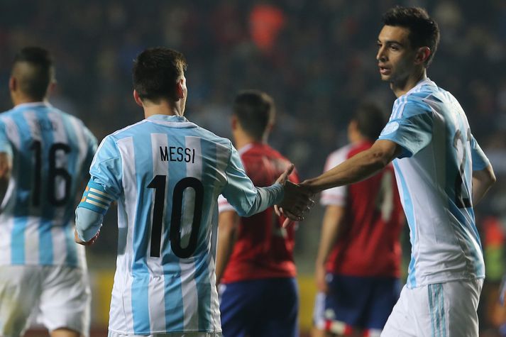 Javier Pastore og Lionel Messi.