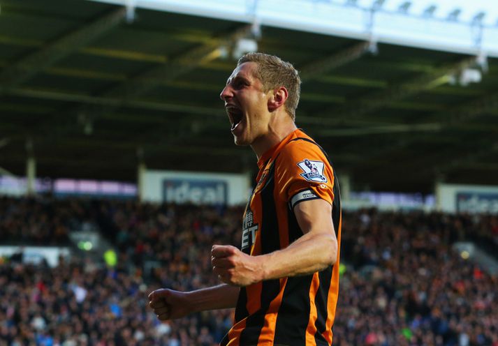 Michael Dawson fagnar marki sínu