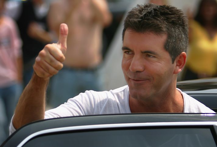 Simon Cowell treystir á lífvörðinn sinn.