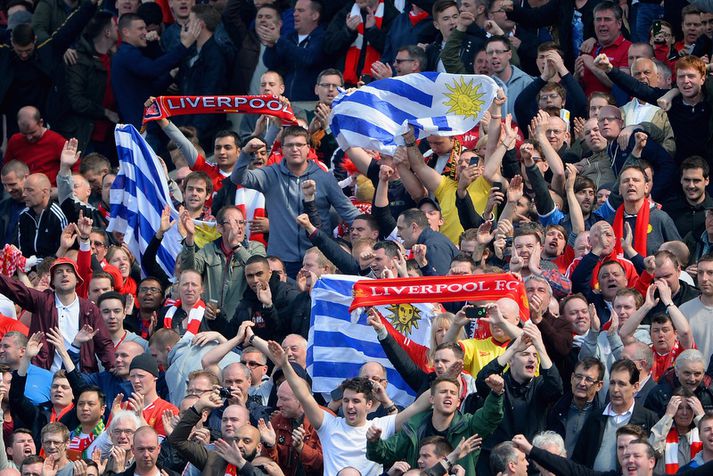 Stuðningsmenn Liverpool á Carrow Road í dag.