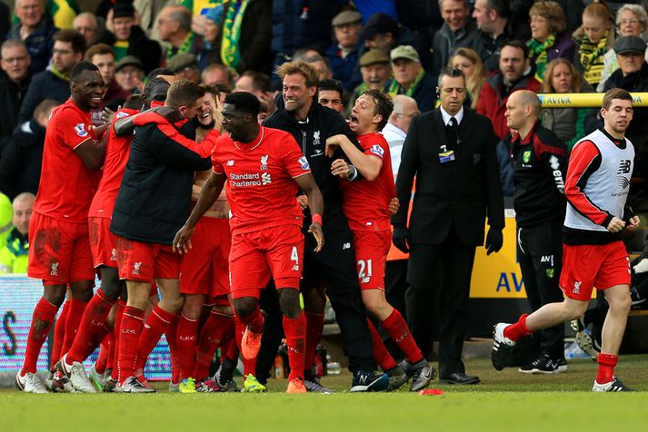 Leikmenn og stjórinn Jürgen Klopp fagna sigurmark Adam Lallana.