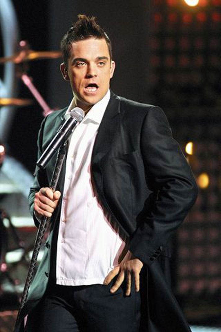 Robbie williams. Tónlistarmaðurinn breski hefur frestað för sinni til Asíu.