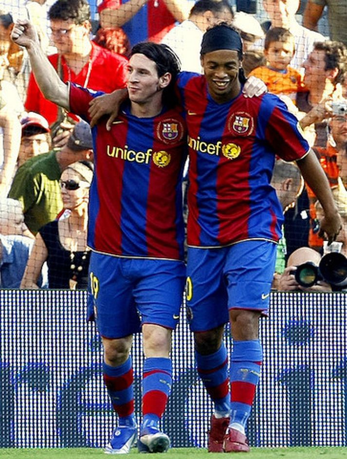 Ronaldinho ásamt félaga sínum Lionel Messi.