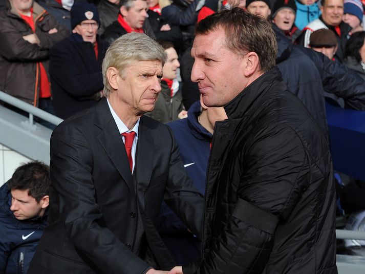 Wenger tekur í hönd Brendan Rodgers, stjóra Liverpool, fyrir leikinn í dag.