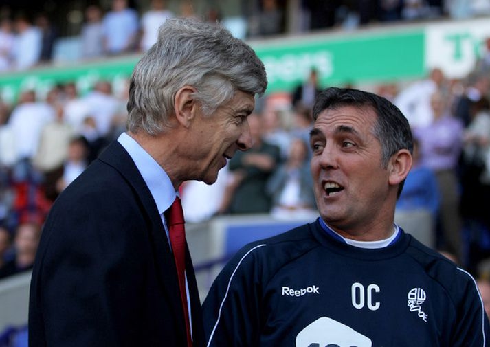 Coyle er hér með Arsene Wenger, stjóra Arsenal.