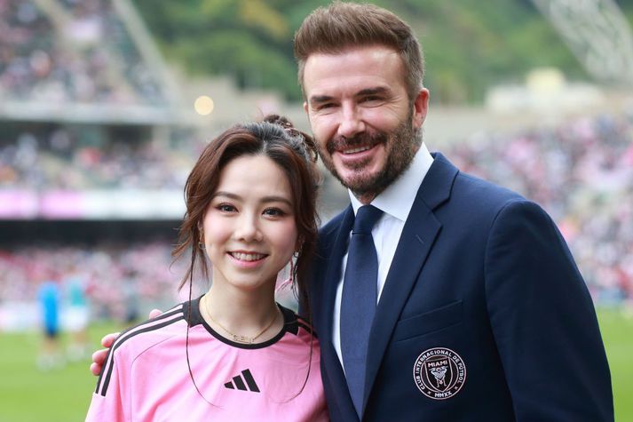 David Beckham stillir sér upp ásamt poppstjörnunni G.E.M. fyrir leikinn