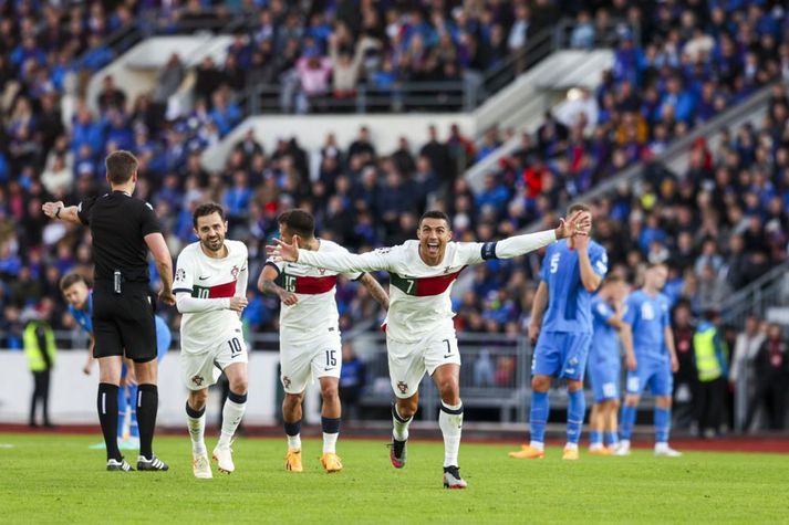 Ronaldo á Laugardalsvelli í júní eftir mark gegn Íslandi.