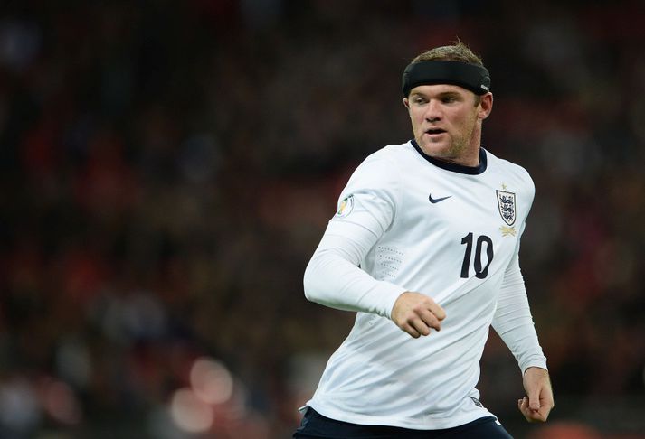 Rooney með bandið góða.