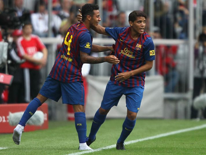Thiago og Jonathan dos Santos, markaskorarar Barcelona, fagna í leiknum í dag.