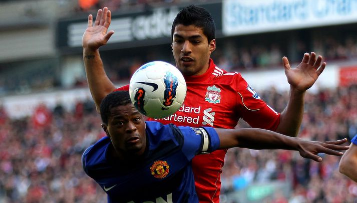 Luis Suarez og Patrice Evra.