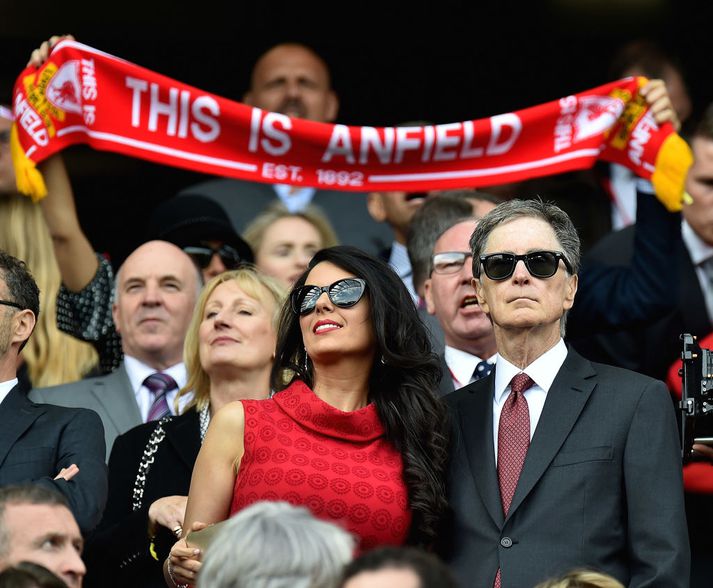 Henry með eiginkonu sinni í stúkunni á Anfield