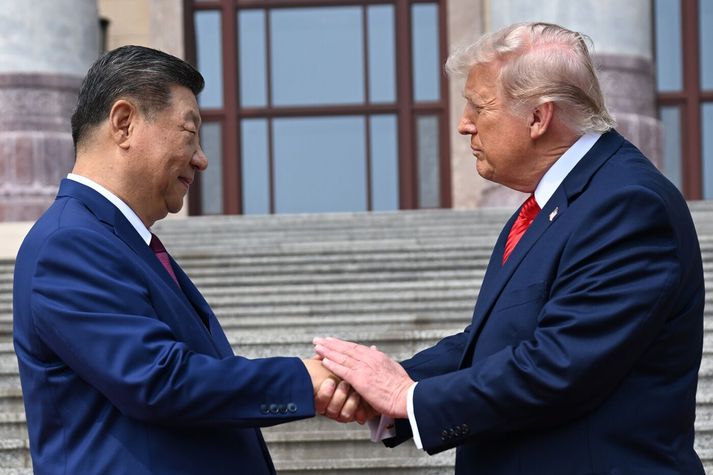 Xi Jinping og Donald Trump. Trump fór til Kína til að ræða viðskipti ríkjanna en Xi virðiast hafa lagt mikla áherslu á málefni Taívan, sem Kínverjar segjast eiga og hafa hótað að taka með hervaldi.