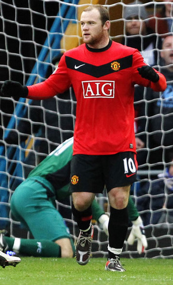 Wayne Rooney fagnar einu marka sinna í dag.