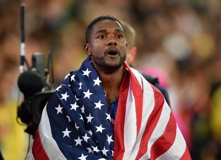 Justin Gatlin vann óvæntan sigur í 100 metra hlaupi á HM í gær.