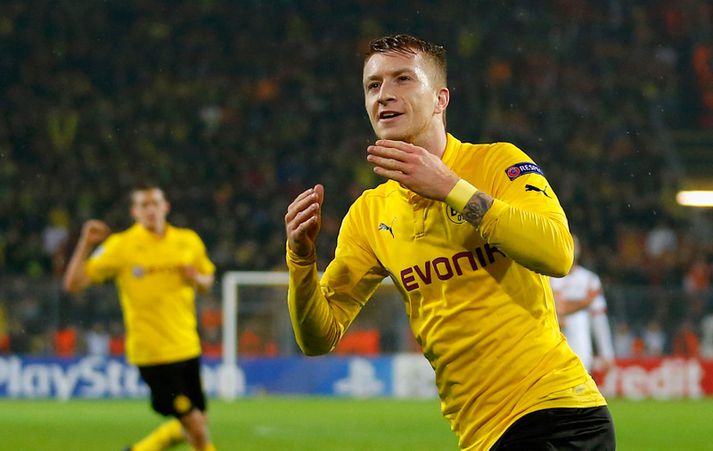 Marco Reus fagnar í leik með Dortmund.