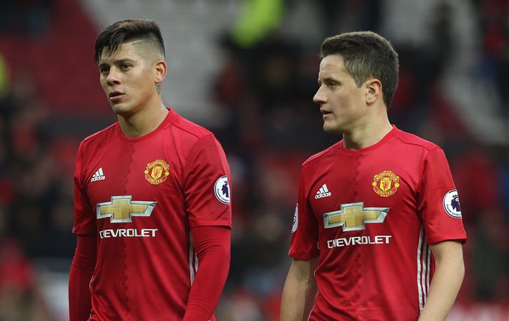 Herrera og Marcos Rojo.