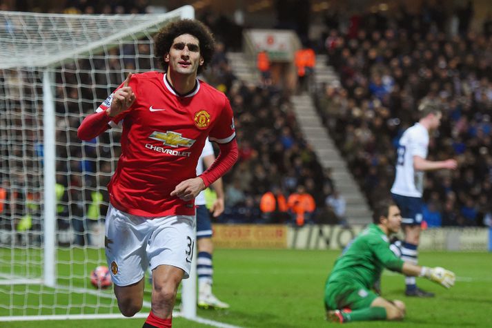 Fellaini fagnar marki sínu.