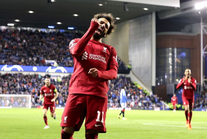 Mohamed Salah fagnar einu af þremur mörkum sínum á Ibrox í gær.