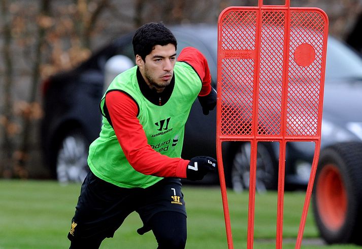 Suarez á æfingu hjá Liverpool í gær.