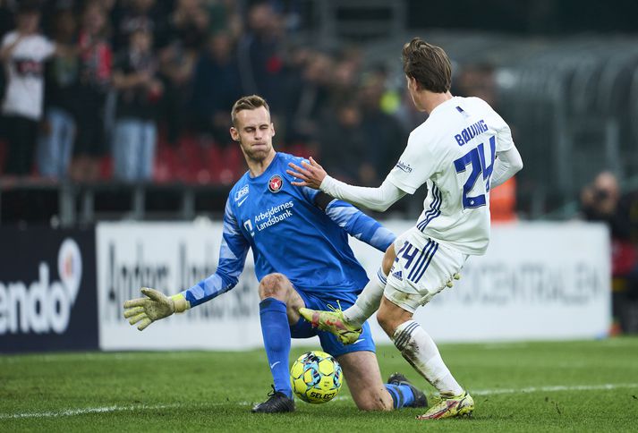 Elías Rafn Ólafsson ver skot frá William Boving í leik FC København og Midtjylland í dönsku úrvalsdeildinni. Elías segir leikinn einn þann eftirminnilegasta á ferlinum.