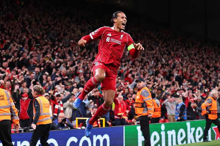 Virgil van Dijk fagnar sigurmarki sínu gegn Atlético Madrid.