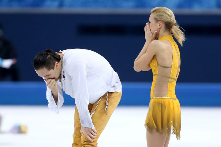 Tatiana Volosozhar og Maxim Trankov sýndu miklar tilfinningar eftir lokaæfinguna.