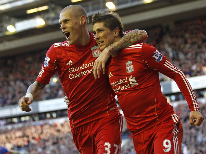 Fernando Torres fagnar marki sínu um helgina með Martin Skrtel.