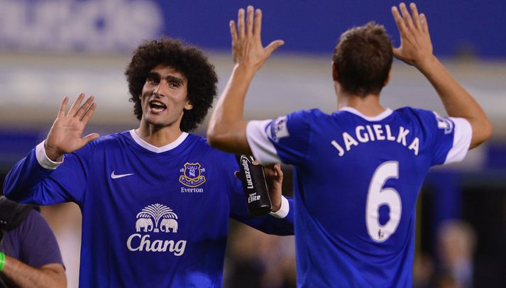 Phil Jagielka og Marouane Fellaini fagna sigri í kvöld.