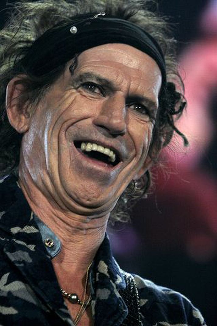 Gítarleikari Rolling Stones er ekki hættur að drekka áfengi.