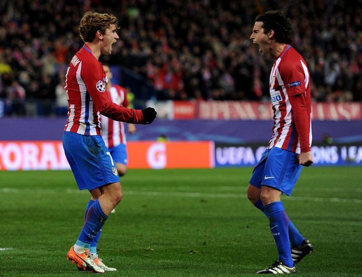 Antoine Griezmann og Tiago hjá Atlético Madrid fagna í gær.
