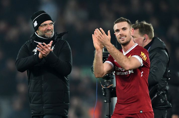 Jürgen Klopp og Jordan Henderson höfðu ástæðu til að brosa eftir sigurinn í dag.