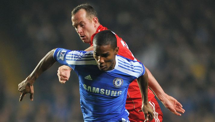 Adam í baráttunni við Florent Malouda í dag.