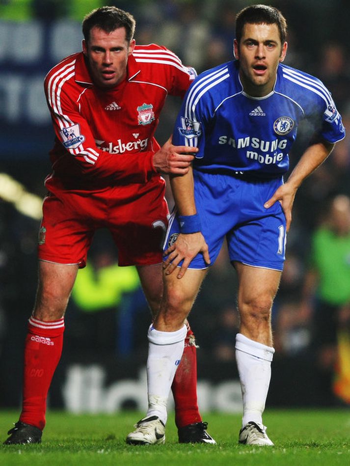 Jamie Carragher og Joe Cole þegar þeir voru andstæðingar.
