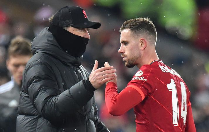 Jürgen Klopp og Jordan Henderson.