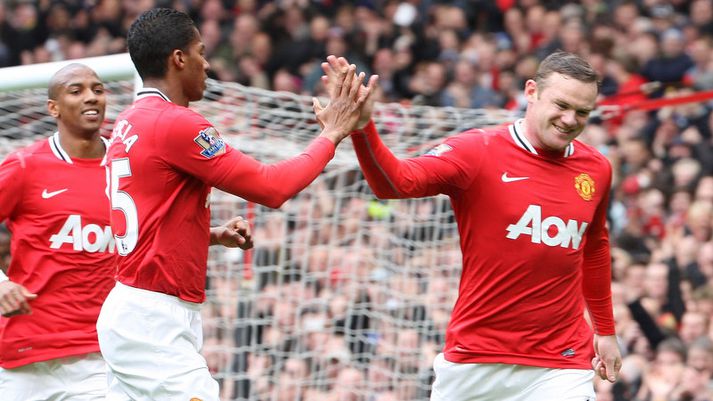 Wayne Rooney fagnar marki sínu.
