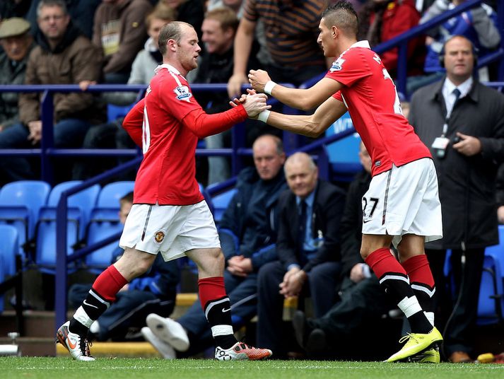 Federico Macheda og Wayne Rooney.