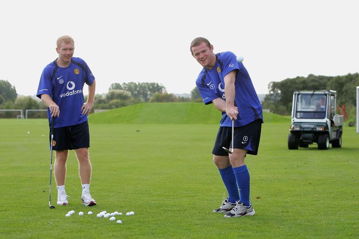 Scholes og Rooney verða með golfkylfurnar á lofti um helgina.