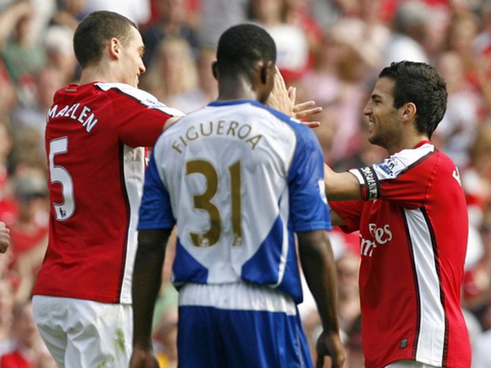 Thomas Vermaelen fagnar marki með Fabregas fyrr í vetur.